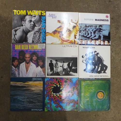 2082 - 90 Various LP records including Madness, Aztec Camera, Tom Waits, Ultravox, The Beatles and Eric Cla... 