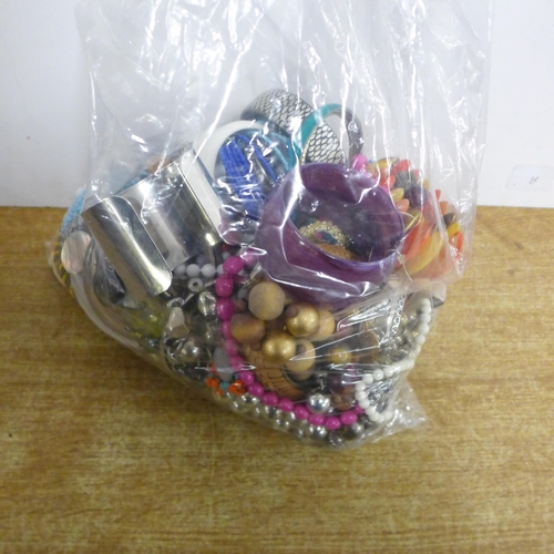 2086 - Three large bags of costume jewellery