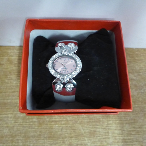 2097 - Boxed wristwatches including Accurist and pink Anais Couture