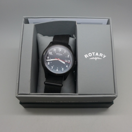 2106 - A men's Rotary quartz movement wristwatch with black dial and black fabric strap * this lot is subje... 