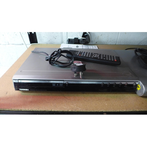 2144 - 2 DVD players; a Toshiba RD-XS25 and a Welkin DVD player (T-333), both with remotes and cables