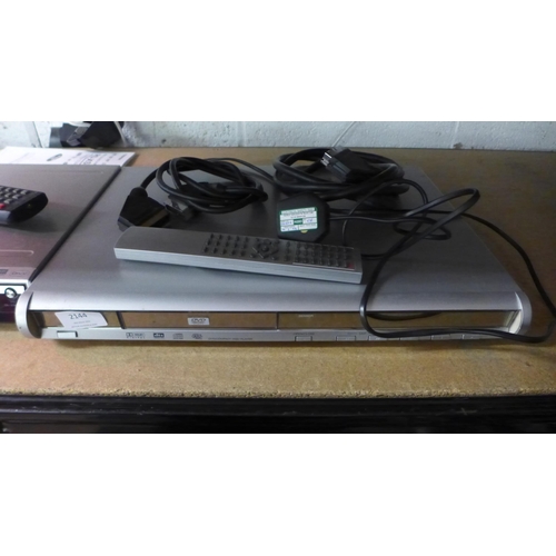 2144 - 2 DVD players; a Toshiba RD-XS25 and a Welkin DVD player (T-333), both with remotes and cables