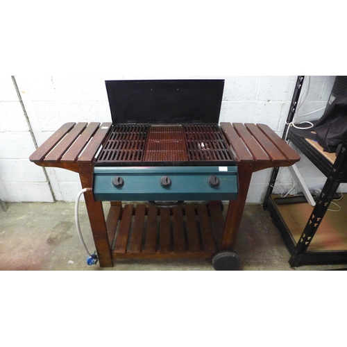 2146 - An Outback gas powered barbecue with hot plate