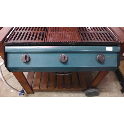 2146 - An Outback gas powered barbecue with hot plate