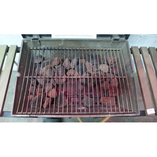 2147 - An OMC Broil King gas barbecue with instruction booklet and a 4.5kg Eurogas gas canister