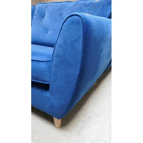 1540 - A blue velvet Hoxton three seater sofa