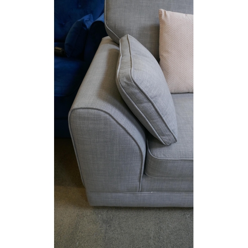 1543 - A grey upholstered two seater sofa - stained