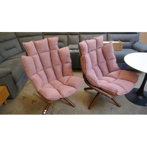 1581 - A pair of swivel lounge chairs