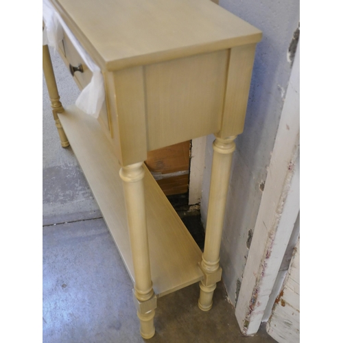 1593 - A three drawer console table