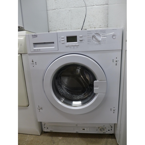 2158 - A Beko (WM161241) 6.5kg 1200 spin integrated washing machine