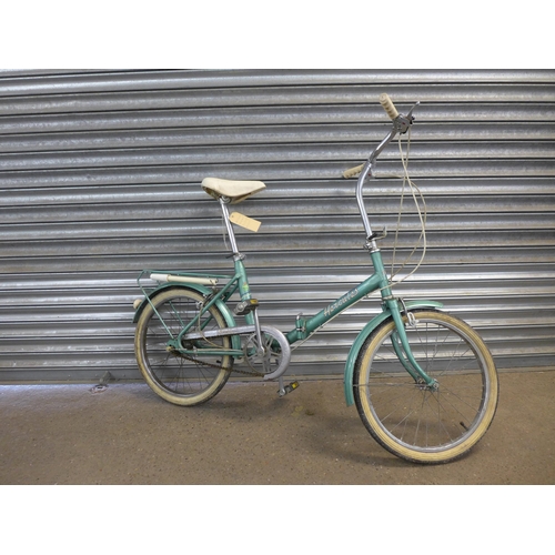 2167 - A Hercules compact folding bike with 3 speed gears and Brooks saddle