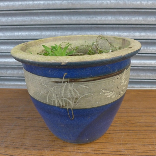 2200 - A pair of blue glazed planters