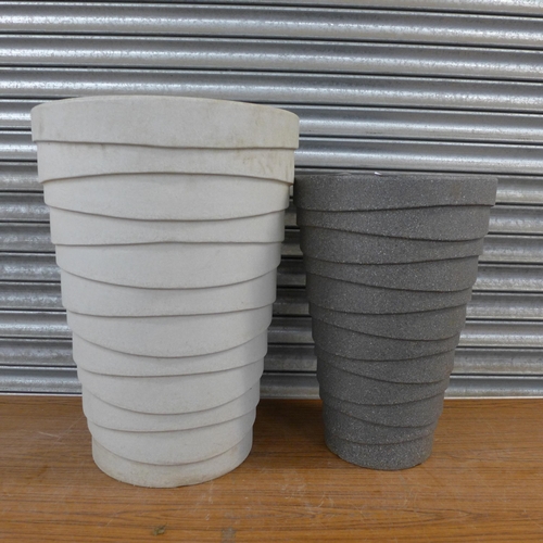 2203 - 2 Large plastic planters (65cm tall and 55cm tall)