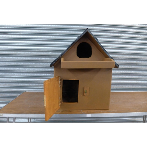 2224 - A wooden painted owl box with felted roof and door with latch