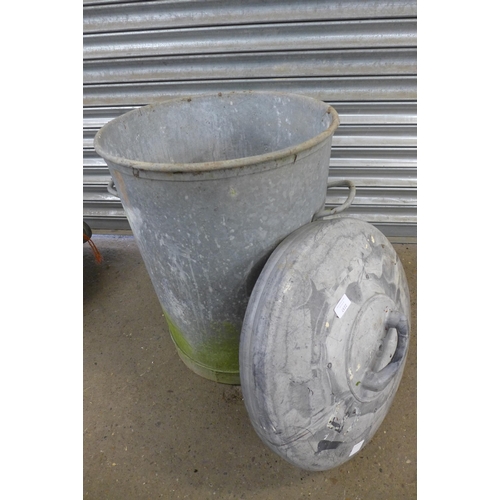 2237 - A selection of galvanised steel items including two dustbins with lids, a wash bucket and a galvanis... 