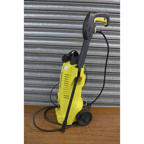 2256 - A Karcher K4 pressure jet wash with hose and lance