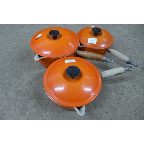 Three Le Creuset saucepans including an 18cm, 20cm and 22cm saucepan ...