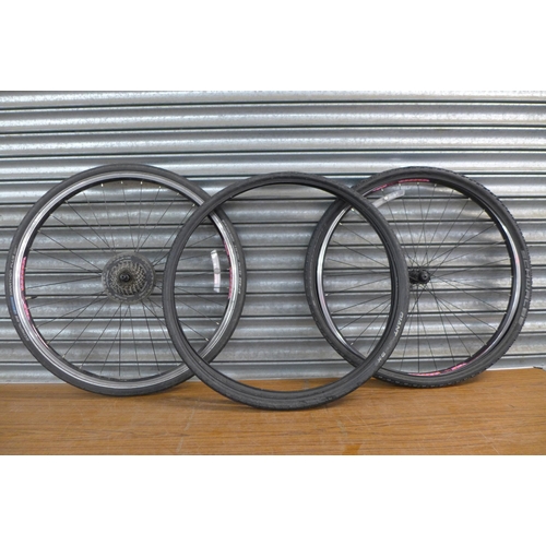 2297 - A set of bike wheels (including shimano gear cassette) with a set of Schwalbe bike tyres and another... 