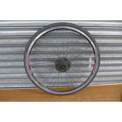 2297 - A set of bike wheels (including shimano gear cassette) with a set of Schwalbe bike tyres and another... 