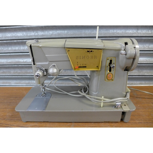 2319 - A vintage Singer 328K 240v electric sewing machine - complete with pedal and protective case