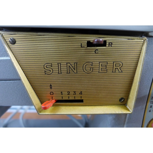 2319 - A vintage Singer 328K 240v electric sewing machine - complete with pedal and protective case