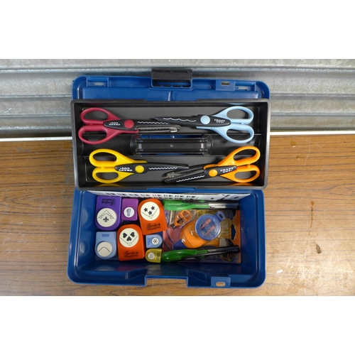 2320 - 2 Blue tool boxes, one includes scissors and design punches for arts and crafts, pencils, brushes, b... 