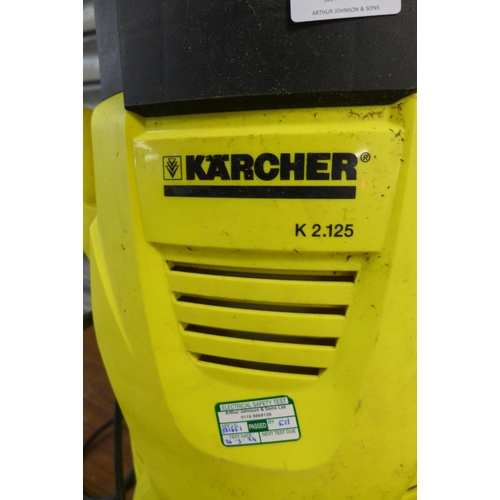 2326 - A Karcher K2.125 pressure washer with hose, lance and patio cleaning attachment