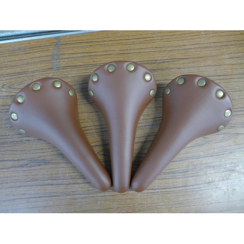 2333 - 3 x Retro”Brooks style” bike saddles in brown faux leather (unused)