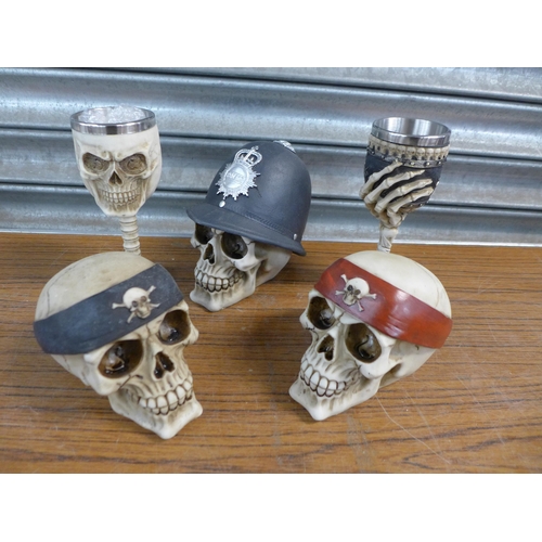 2340 - 4 Skull piggy banks and 2 skull goblets