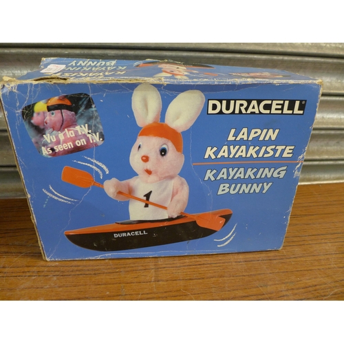 2341 - A pair of UFC Ultimate Kombat Pro 14OZ gloves and a Duracell Kayaking bunny