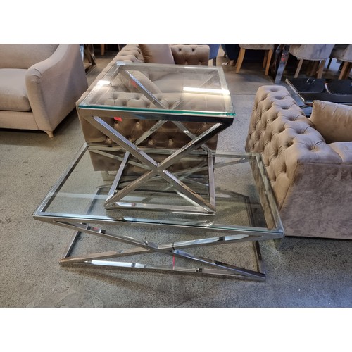 1525A - A chrome and glass coffee table and lamp table *This lot is subject to VAT