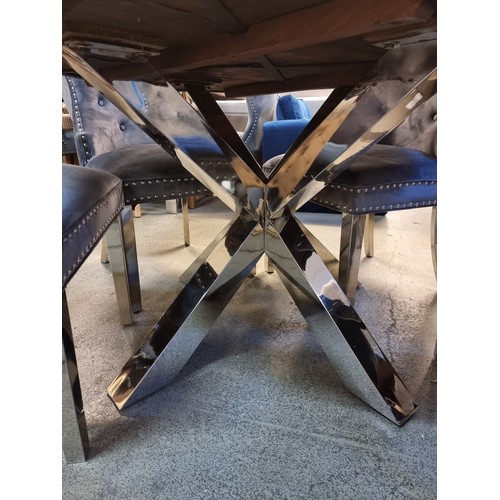 1538A - A Black glass and chrome 'x' base coffee table *This lot is subject to VAT