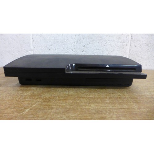 2071 - A PlayStation 3 slim console (audio/video cables only) and a quantity of assorted video games includ... 