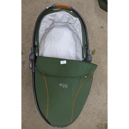 2273 - An Egg infant and child transport system including push chair and pram attachments and rain cover et... 