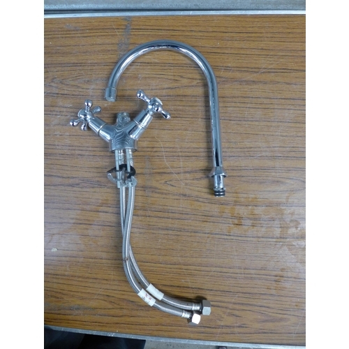 2337 - A Kidson twin lever stainless steel kitchen mixer tap with tap hoses and fittings