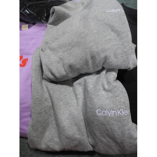 3208 - Quantity of women's Calvin Klein loungewear and two Levi jumpers- mixed size. *This lot is subject t... 