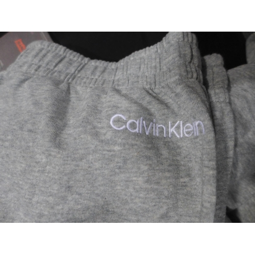 3208 - Quantity of women's Calvin Klein loungewear and two Levi jumpers- mixed size. *This lot is subject t... 