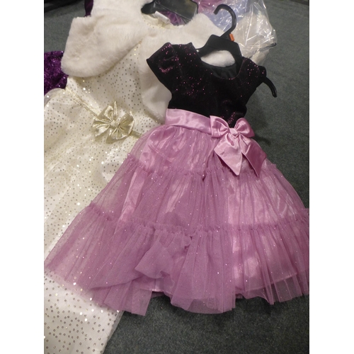 3218 - Quantity of girls party dresses - various sizes, styles and colours. * This lot is subject to VAT