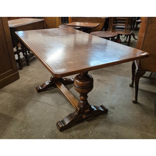 128 - An oak refectory table