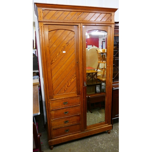 104 - A Victorian Aesthetic Movement pine wardrobe