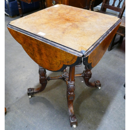 113 - A Victorian walnut envelope drop-leaf occasional table