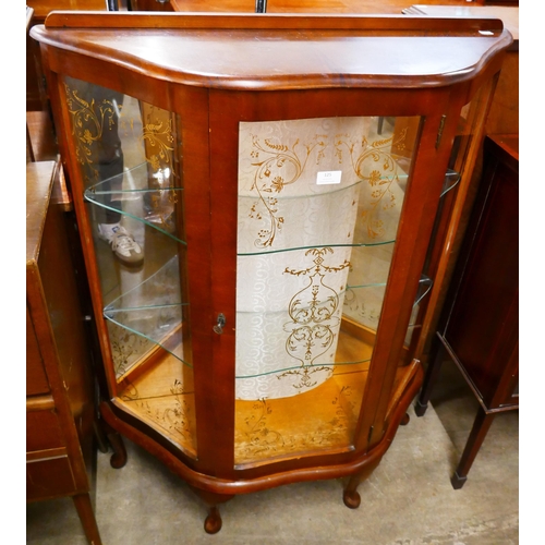 125 - A walnut display cabinet