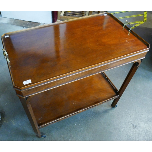 129 - An Edward VII mahogany two tier trolley