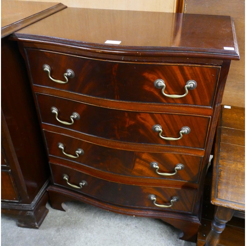 146 - A George III style mahogany serpentine chest of drawers