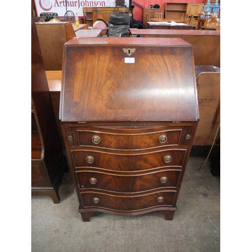 151 - A George III style mahogany bureau