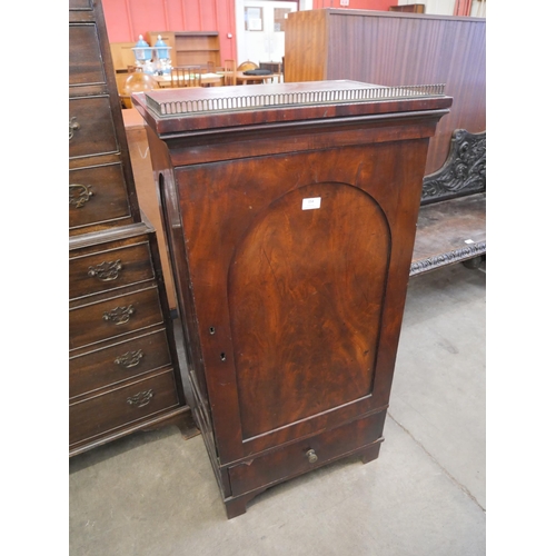 154 - A Victorian mahogany single door cupboard