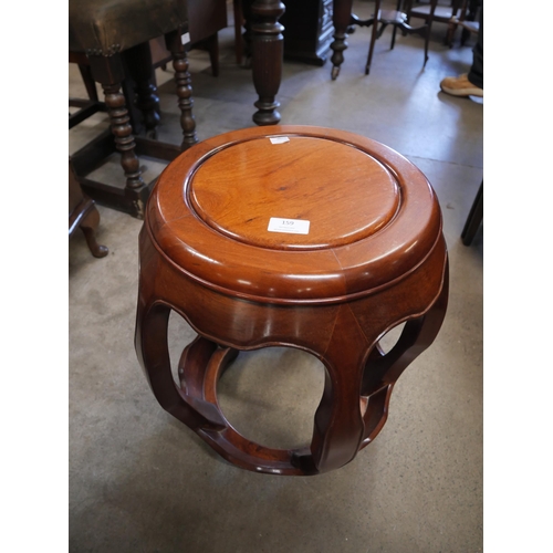 159 - A Chinese hardwood barrel shaped stool