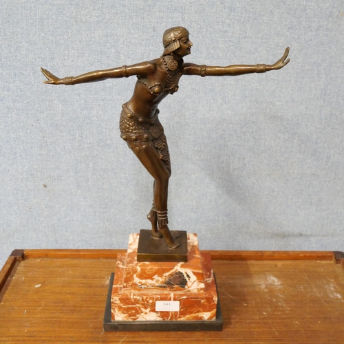 343 - An Art Deco style bronze figure of an exotic female dancer, on rouge marble socle