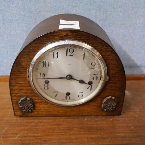 363 - An Enfield oak mantel clock