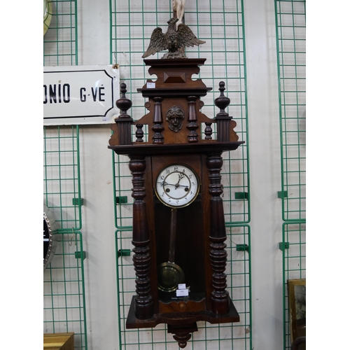 391 - A 19th Century walnut Vienna wall clock